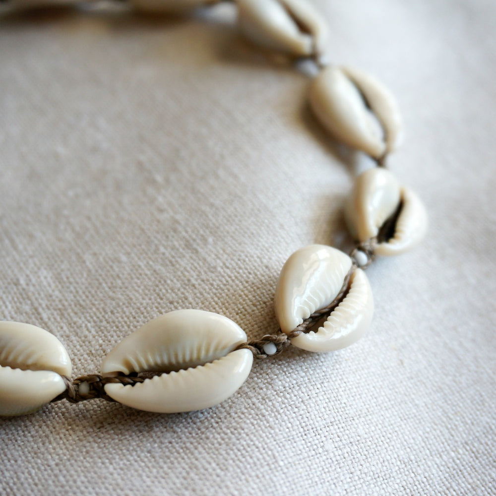 
                  
                    Cowrie Shell Necklace
                  
                