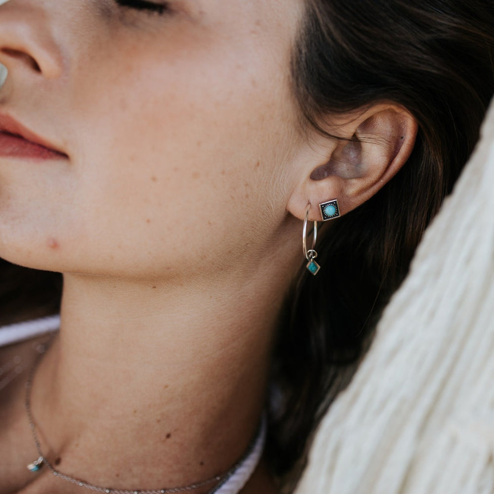 
                  
                    Dir Turquoise Hoop Earrings
                  
                