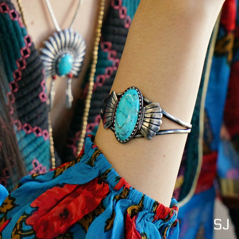 SOWELL JEWELRY Abedabun turquoise bracelet featuring a large oval stone set in sculptural .925 sterling silver