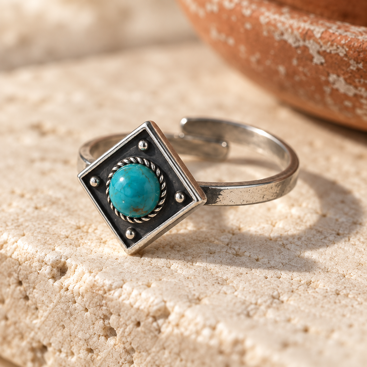 SOWELL JEWELRY Catalina turquoise ring in sterling silver with a square textured setting and adjustable band