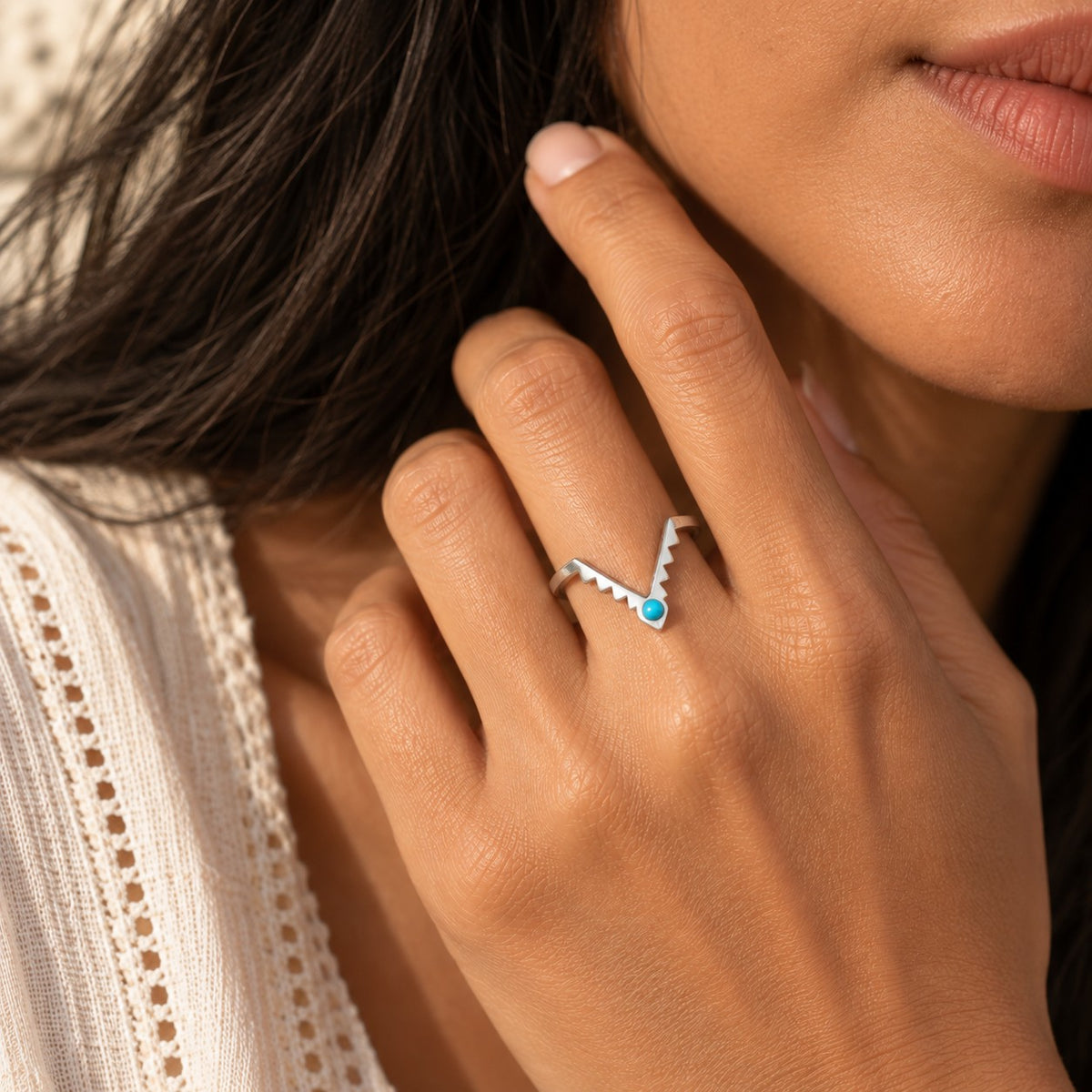 SOWELL JEWELRY Freya ring featuring a petite turquoise stone on a delicate chevron-shaped sterling silver band