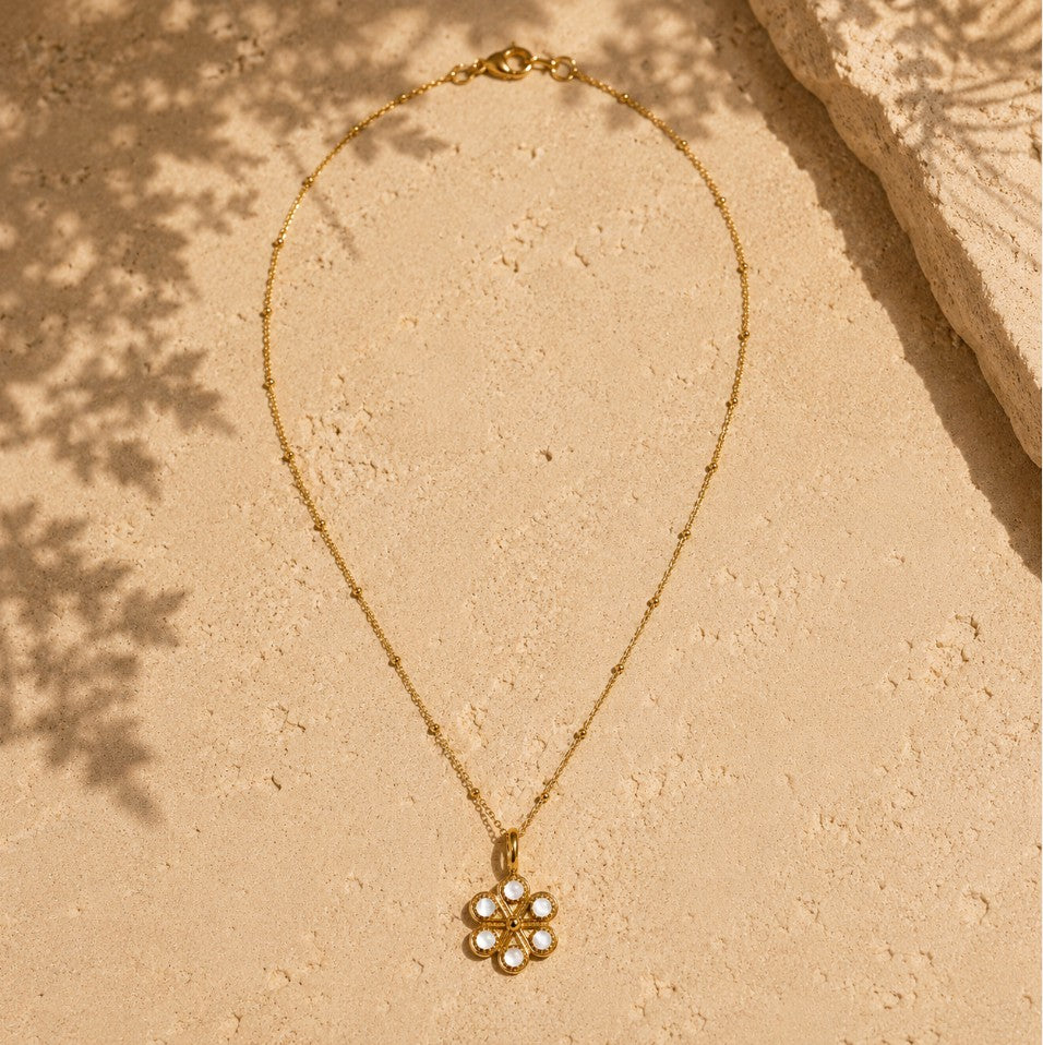 SOWELL JEWELRY 18k gold iris flower necklace with mother of pearl petals on a delicate gold vermeil beaded chain