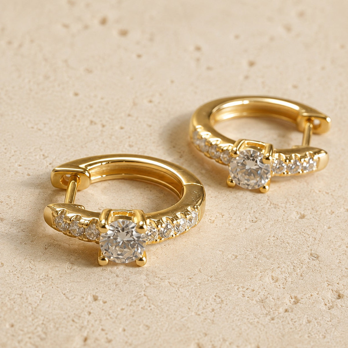SOWELL JEWELRY Aly gold huggie hoop earrings featuring pavé cubic zirconia crystals on 18k gold vermeil.