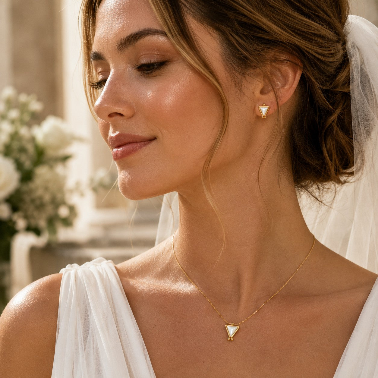 SOWELL JEWELRY Hanale triangle earrings and necklace featuring iridescent mother of pearl set in 18k gold vermeil