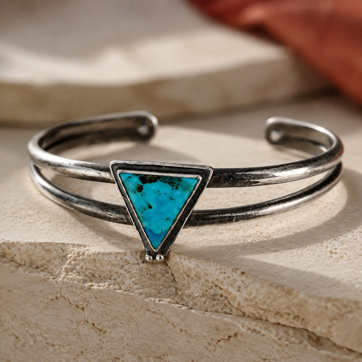 SOWELL JEWELRY Hanale cuff bracelet featuring a triangular turquoise stone set in oxidized sterling silver.