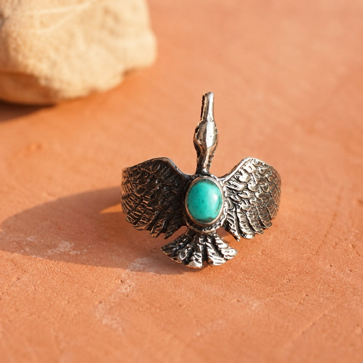 SOWELL JEWELRY sterling silver hawk ring featuring a genuine turquoise stone with detailed oxidized feather wings