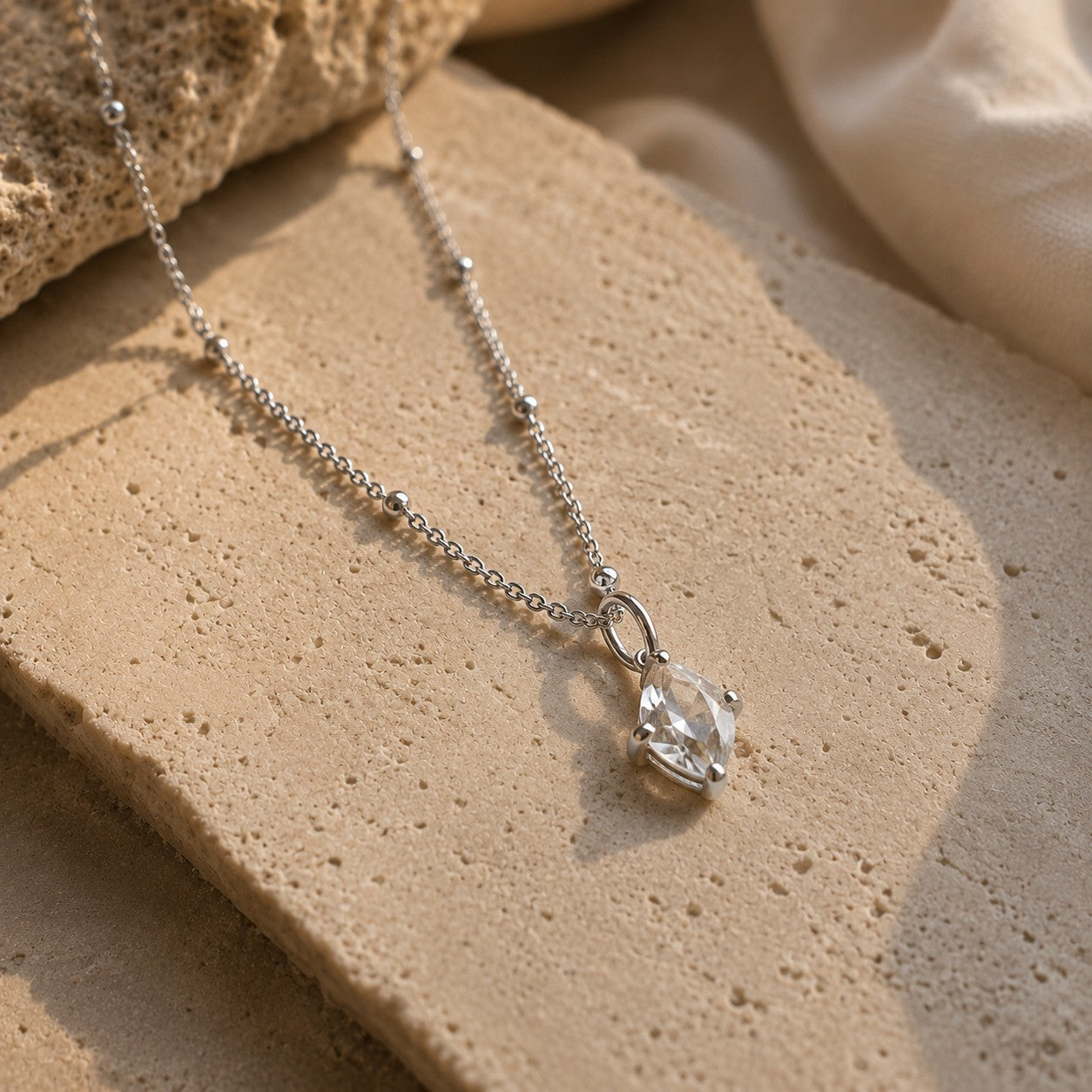 SOWELL JEWELRY Lia necklace featuring a raw Herkimer diamond pendant on a delicate sterling silver beaded chain.