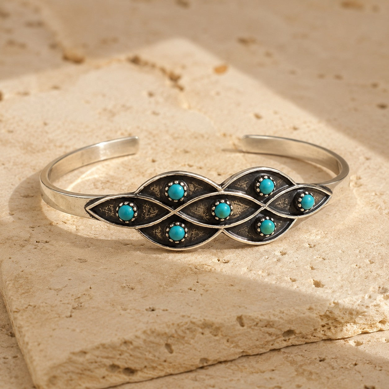 SOWELL JEWELRY Lucia bracelet featuring round turquoise stones set in ornate sterling silver with Southwestern style.