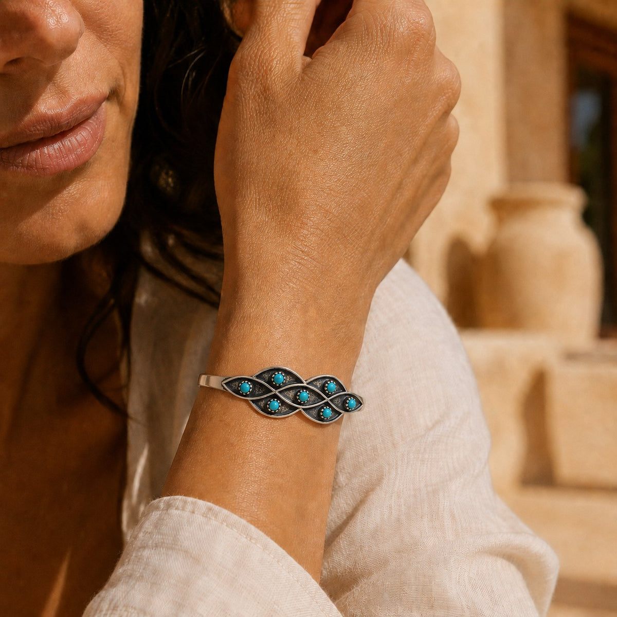 SOWELL JEWELRY Lucia bracelet featuring round turquoise stones set in a sterling silver Southwestern design on a wrist