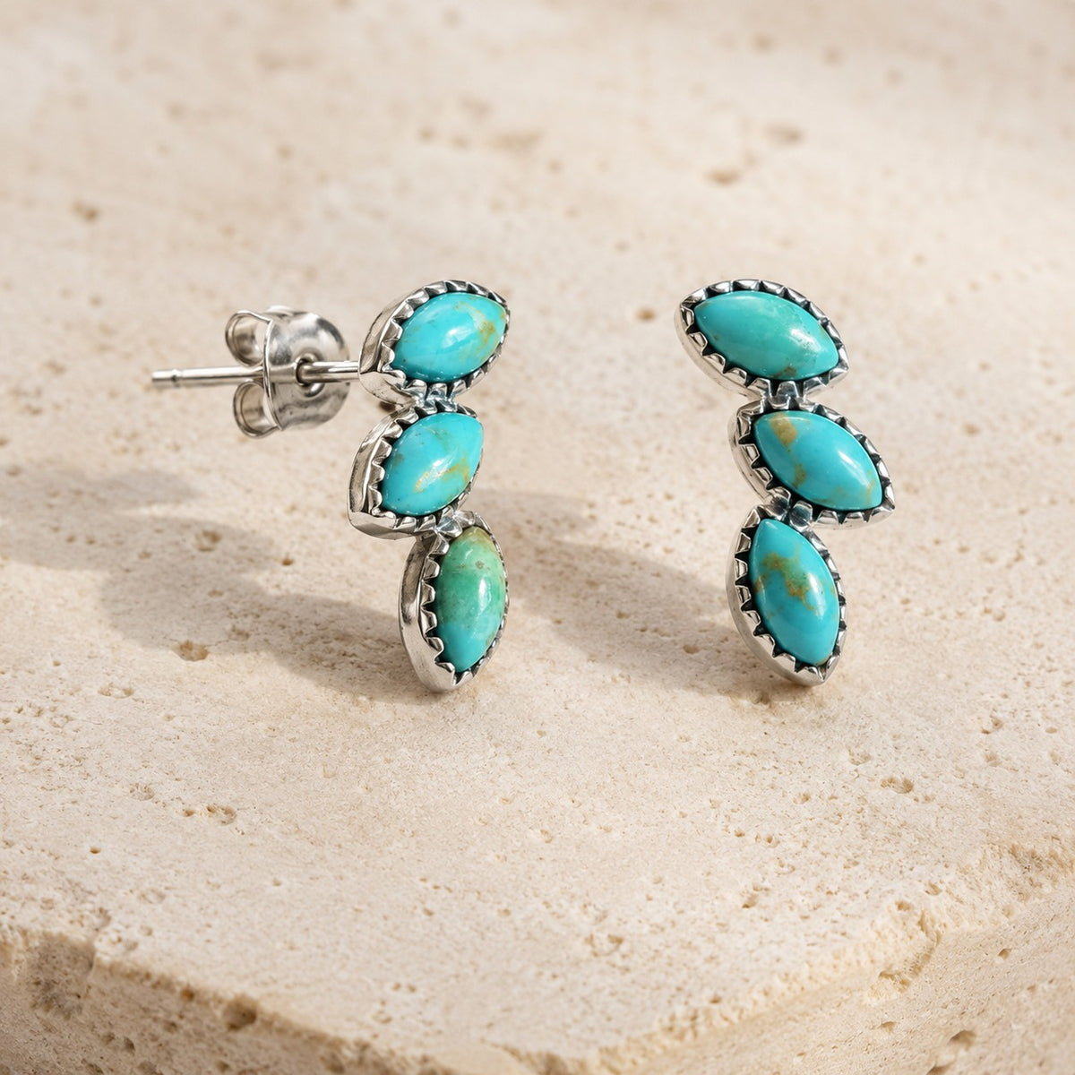 SOWELL JEWELRY Lyra turquoise earrings featuring three marquise-cut blue stones in handcrafted sterling silver settings