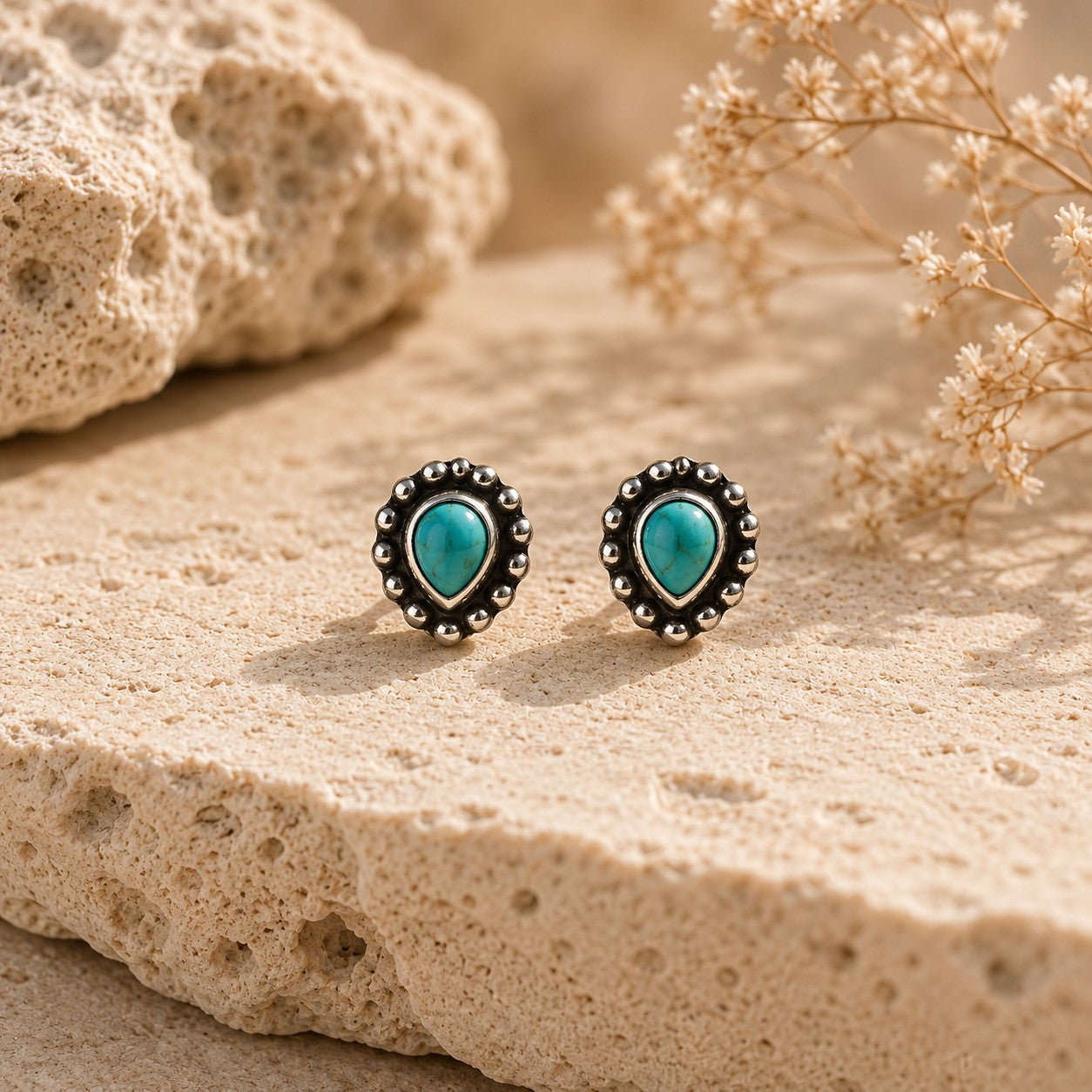 SOWELL JEWELRY Maya stud earrings featuring genuine turquoise stones in handcrafted .925 sterling silver settings.