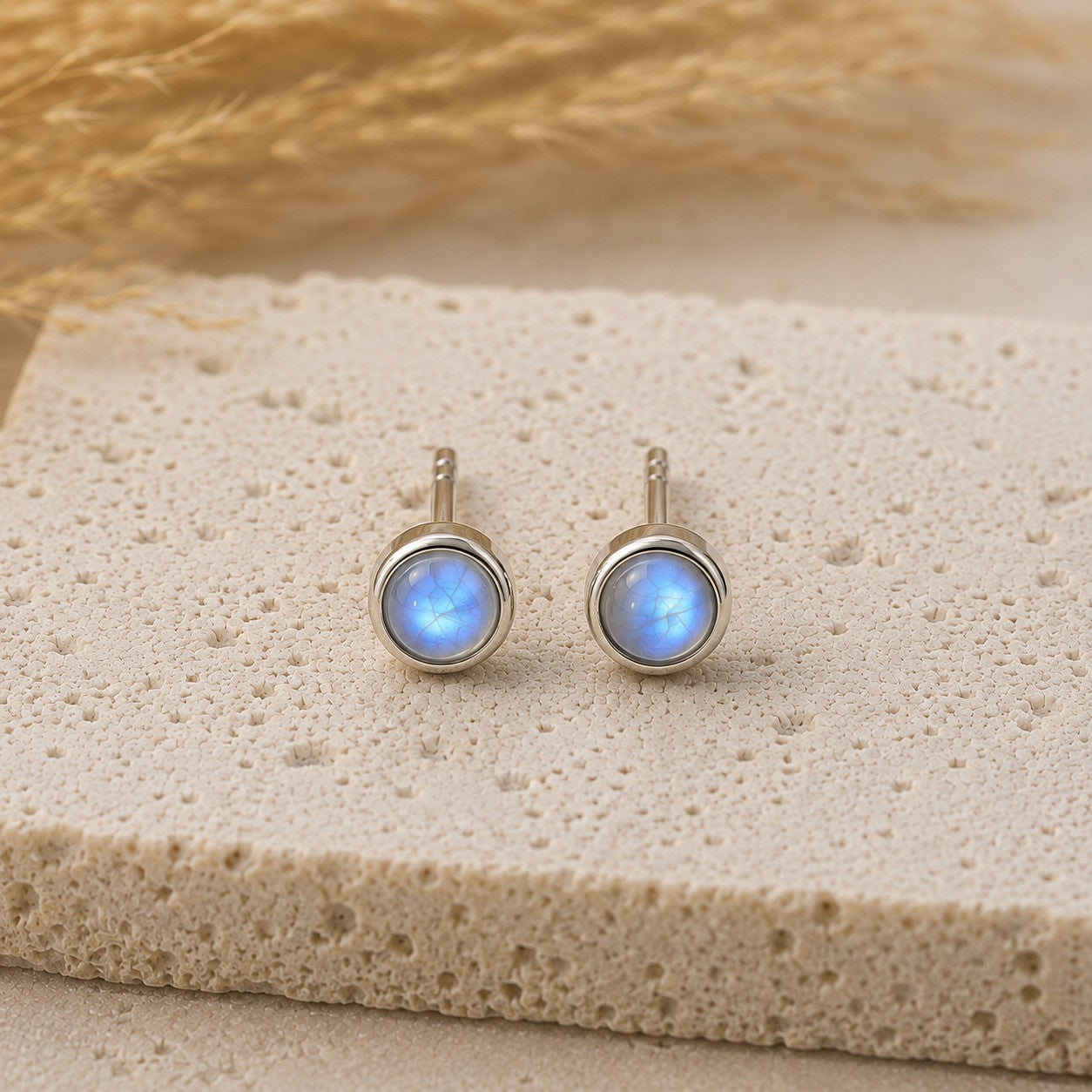 SOWELL JEWELRY minimalist stud earrings featuring 4mm rainbow moonstone in handcrafted .925 sterling silver settings.