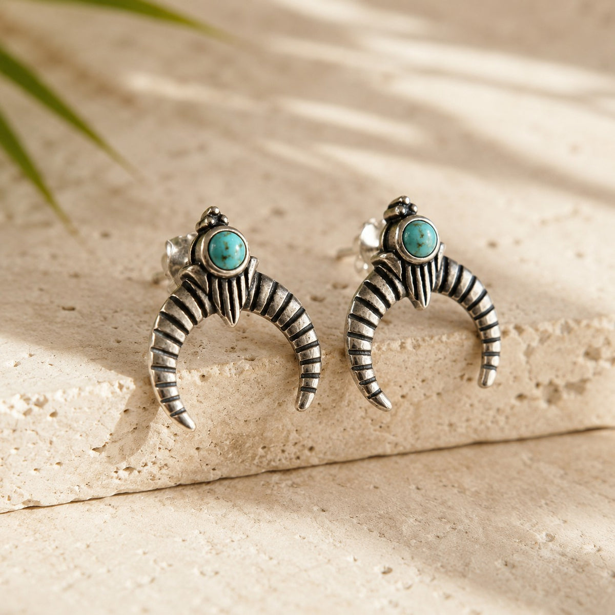 SOWELL JEWELRY Naja crescent stud earrings featuring genuine turquoise stones set in handcrafted sterling silver.