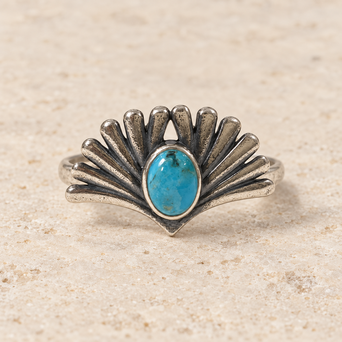 SOWELL JEWELRY Prayer ring featuring an oval turquoise stone set in a fan-shaped oxidized sterling silver band.