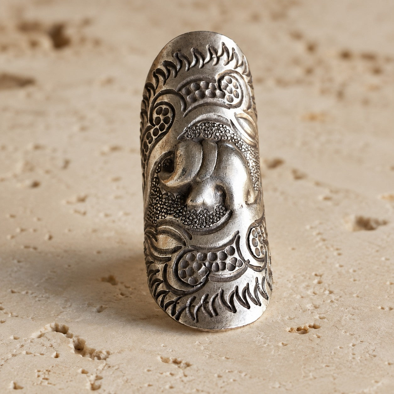 SOWELL JEWELRY sterling silver elephant ring with intricate etched details and a sculptural open band design.