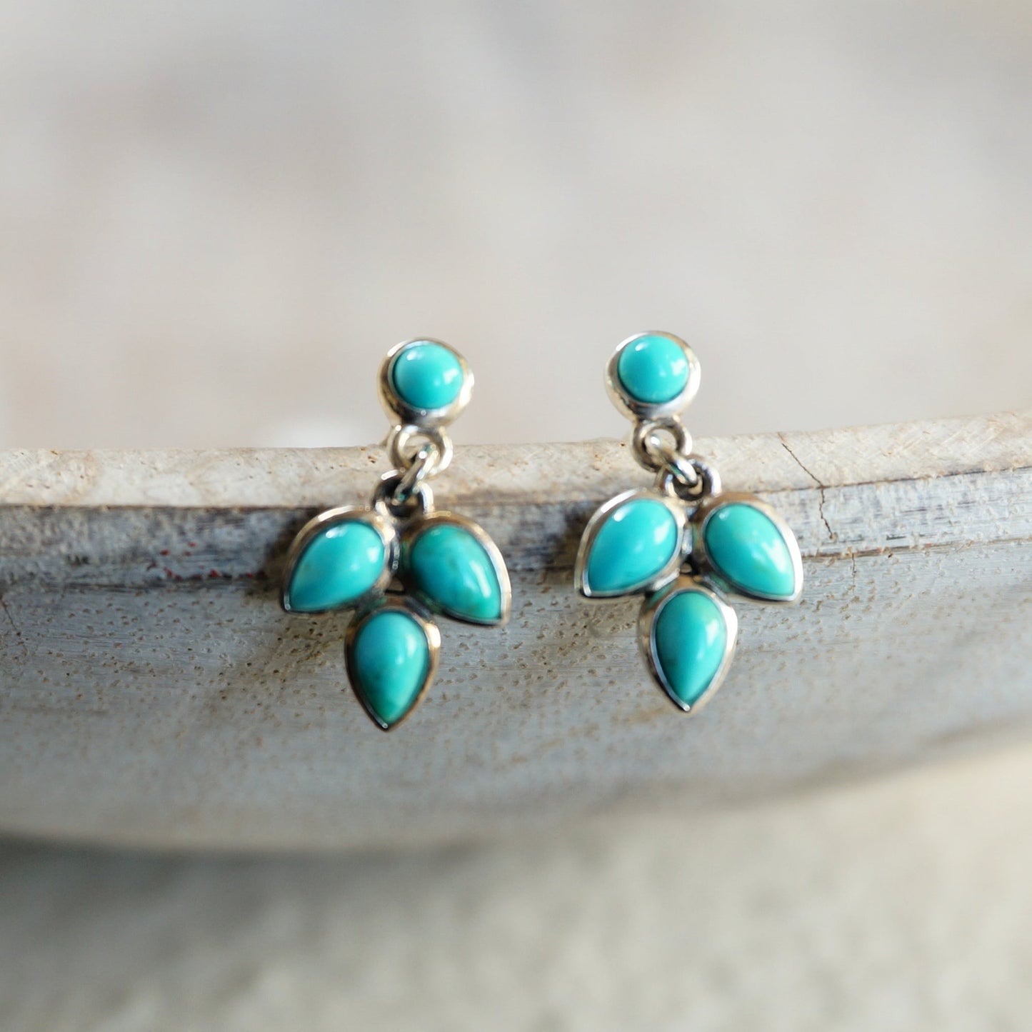 SOWELL JEWELRY Three Leaves earrings featuring genuine blue turquoise stones set in handcrafted .925 sterling silver.