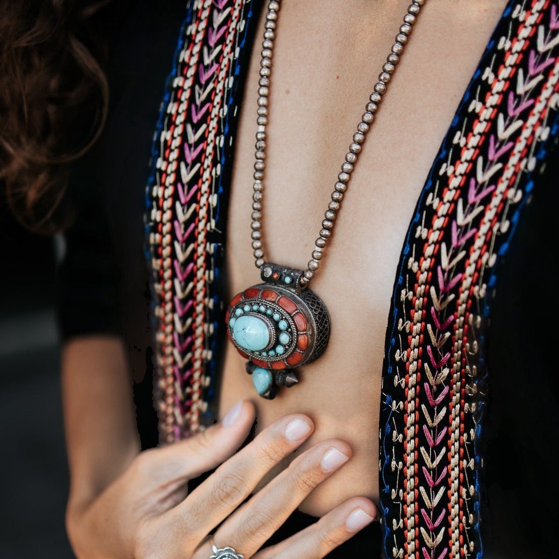 SOWELL JEWELRY Tibetan Gau prayer box pendant in sterling silver with turquoise and coral on a beaded chain