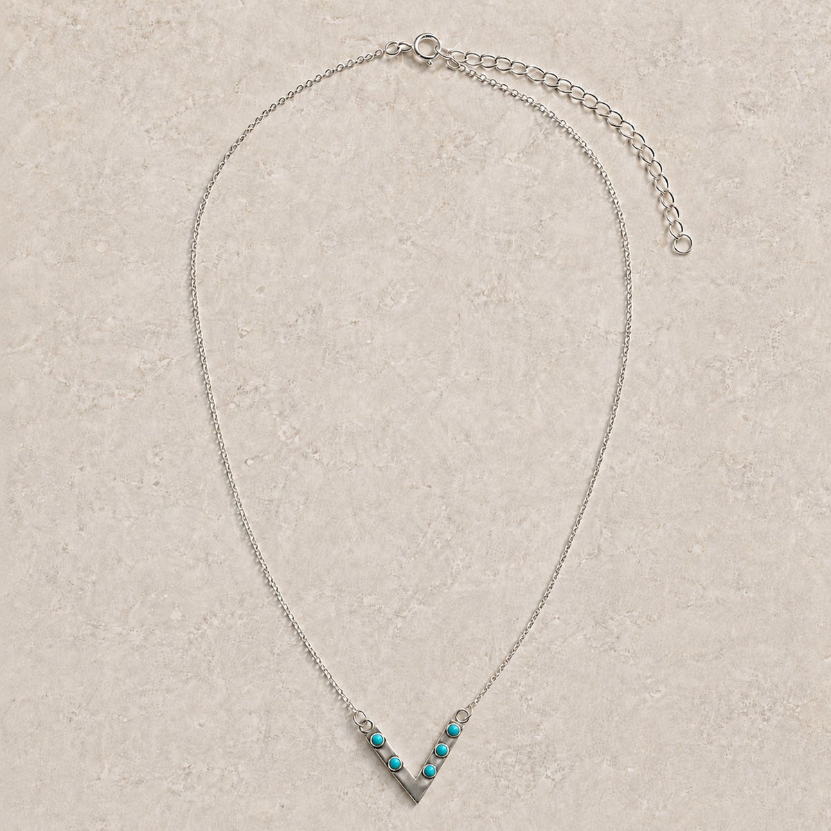 SOWELL JEWELRY Jacy chevron necklace featuring five round turquoise stones set in oxidized sterling silver