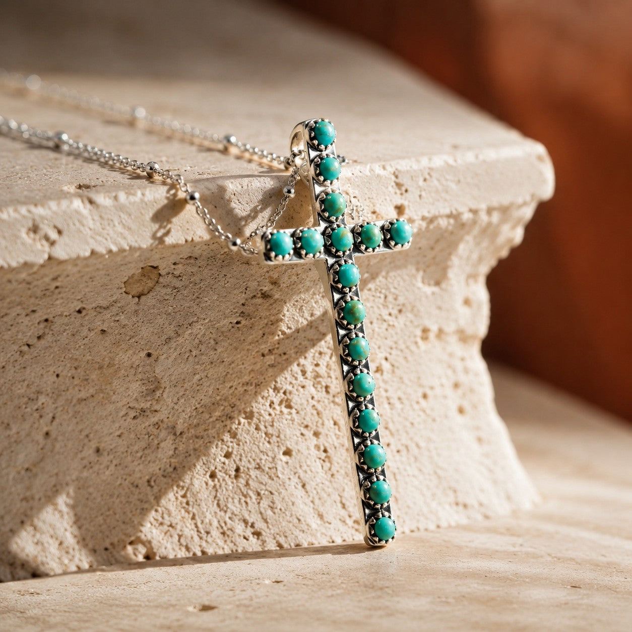 SOWELL JEWELRY Giada cross necklace featuring genuine blue turquoise stones set in handcrafted .925 sterling silver.