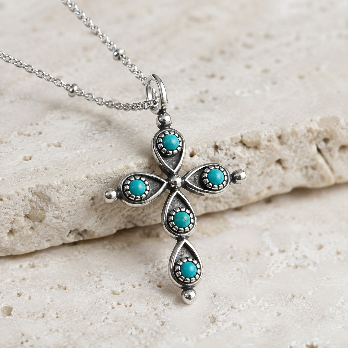 SOWELL JEWELRY Giulia cross pendant necklace featuring genuine turquoise stones set in handcrafted .925 sterling silver.