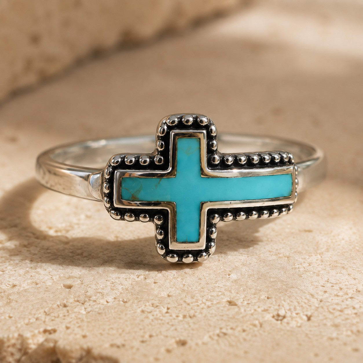 SOWELL JEWELRY Heritage cross ring featuring a genuine turquoise stone set in handcrafted .925 sterling silver.