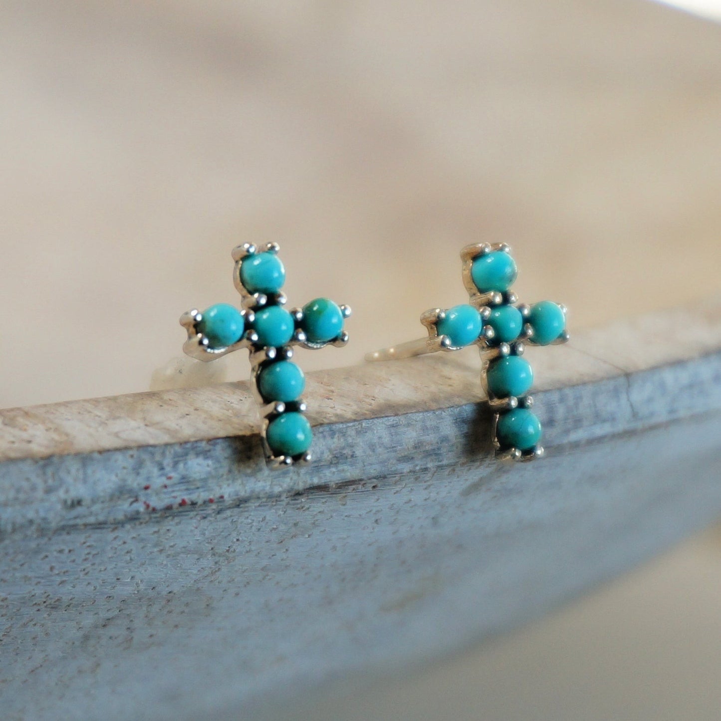 SOWELL JEWELRY turquoise cross stud earrings featuring genuine blue stones set in handcrafted .925 sterling silver.
