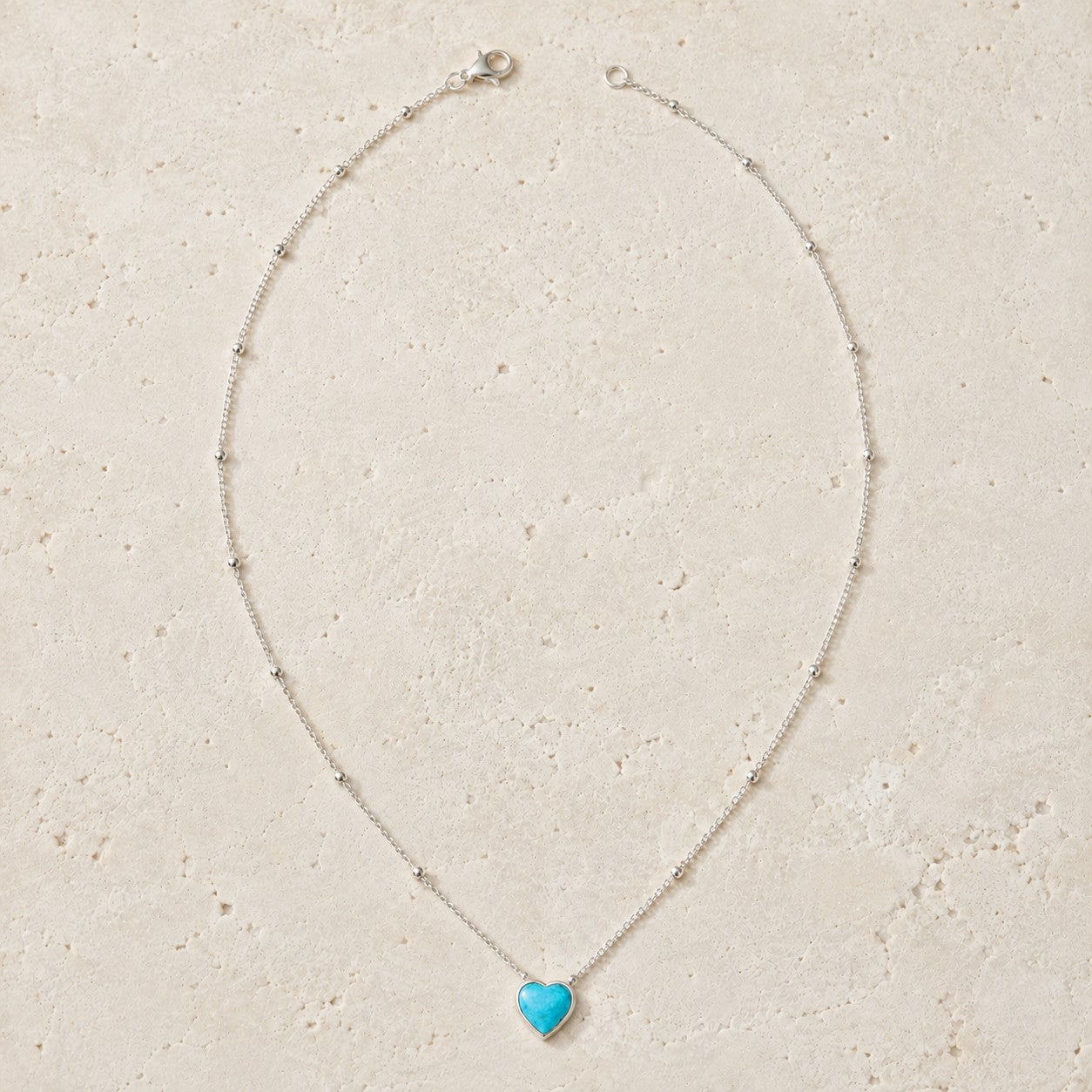 SOWELL JEWELRY heart-shaped turquoise pendant on a delicate sterling silver beaded chain, boho style.