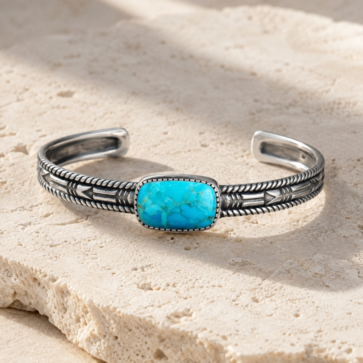 SOWELL JEWELRY Abha turquoise cuff bracelet in .925 sterling silver with southwestern engraved detailing