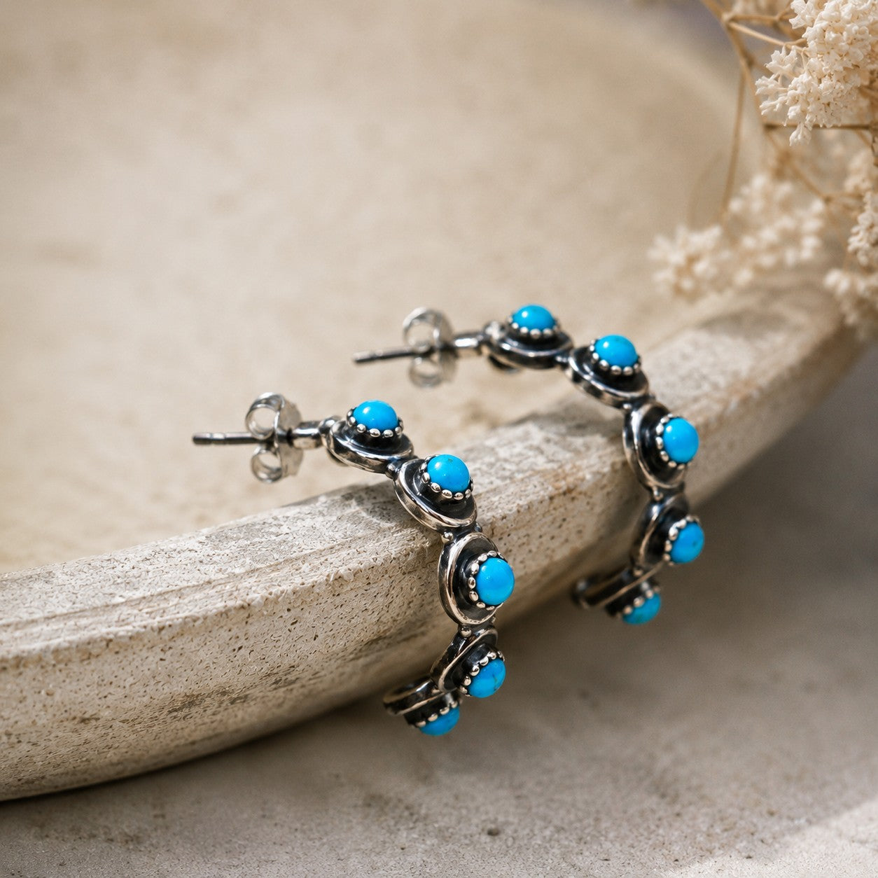 SOWELL JEWELRY Sam hoop earrings featuring genuine turquoise stones set in handcrafted .925 sterling silver.
