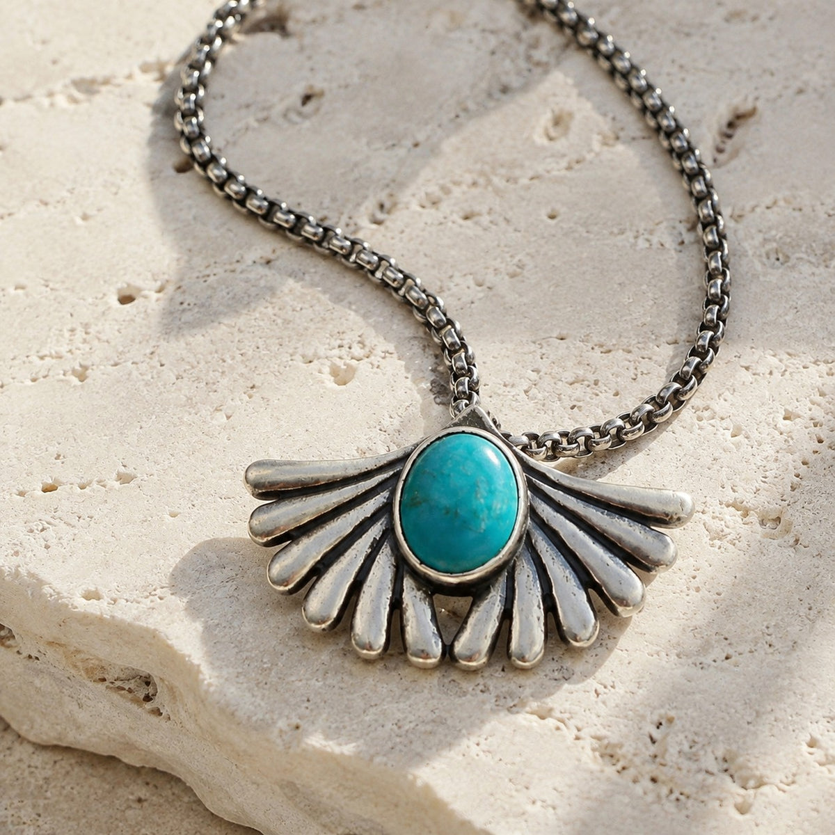 SOWELL JEWELRY Prayer turquoise necklace with a genuine stone in a handcrafted sterling silver fan-shaped setting.