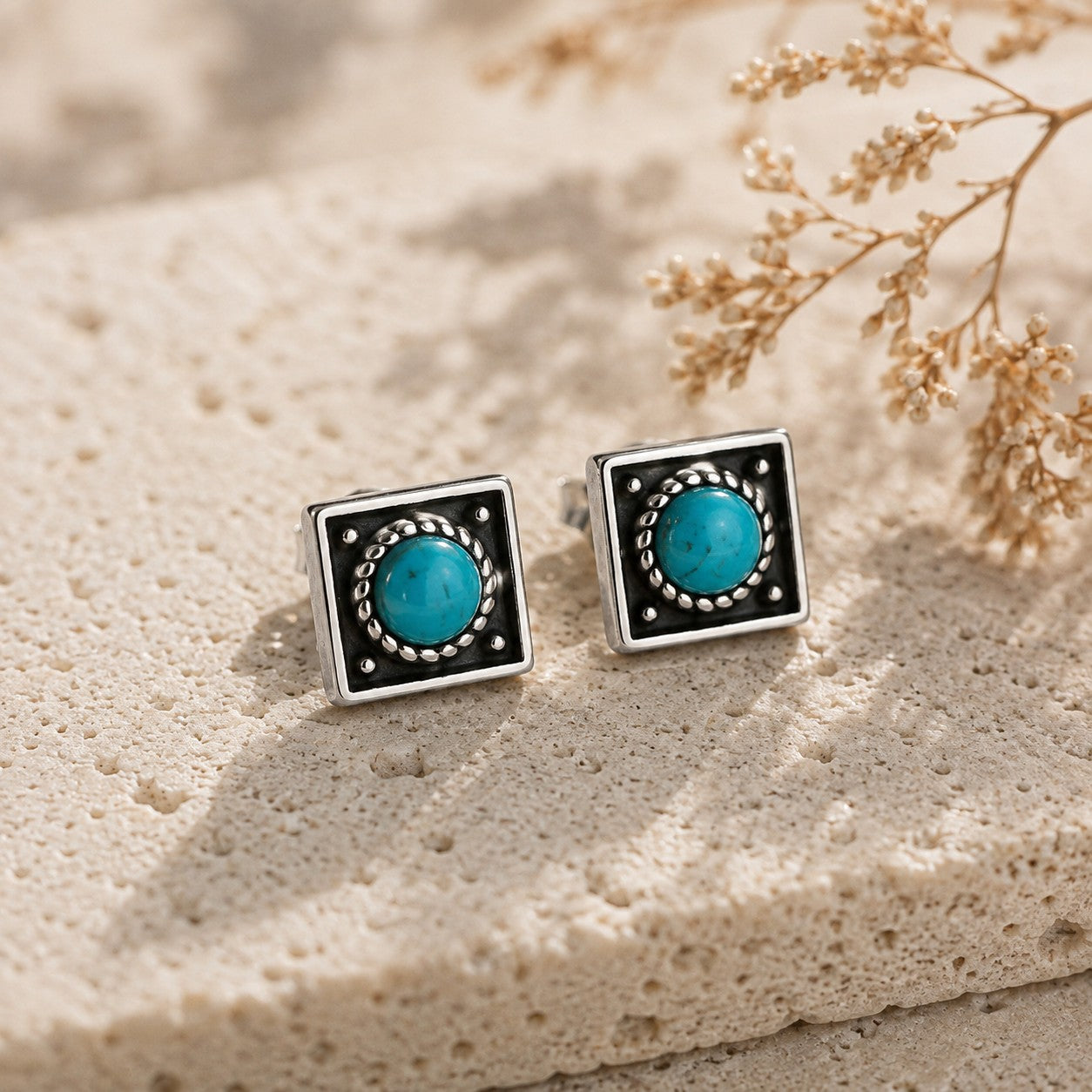 SOWELL JEWELRY Catalina turquoise stud earrings featuring round stones in handcrafted square sterling silver settings.