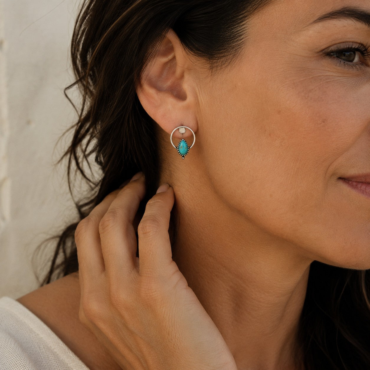 SOWELL JEWELRY Vale hoop earrings featuring a compressed turquoise stone set in handcrafted .925 sterling silver